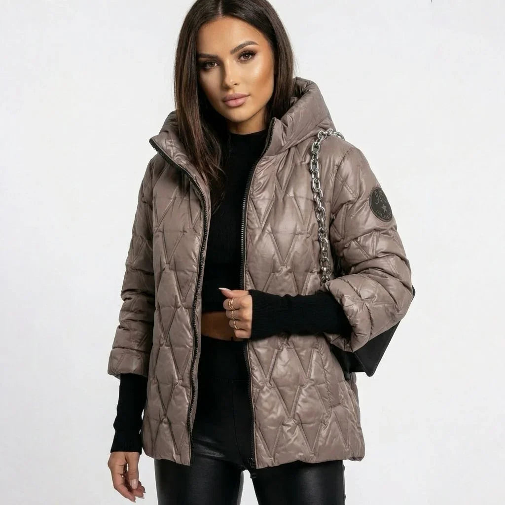 Vogue™ Quilted Cotton Jacket with Structured Hood and Layered Sleeve Design