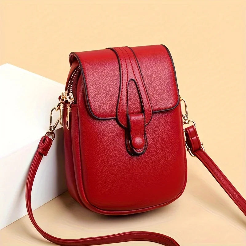 Women's Compact Leather Crossbody Bag with Minimalist Design and Adjustable Strap!