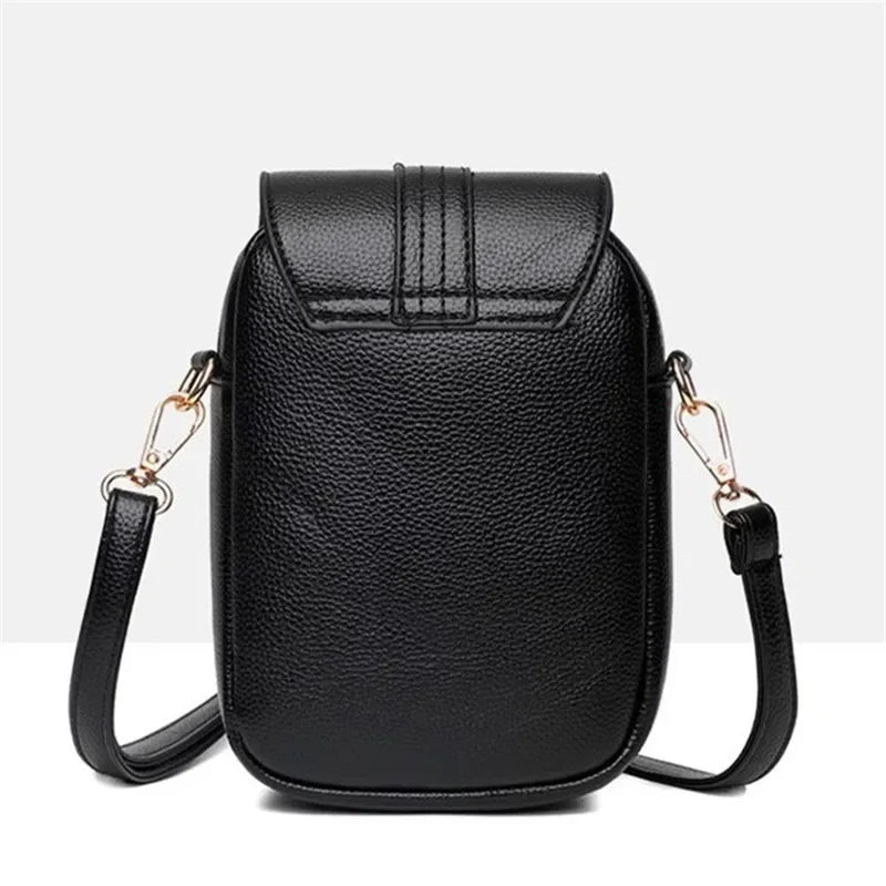 Women's Compact Leather Crossbody Bag with Minimalist Design and Adjustable Strap!