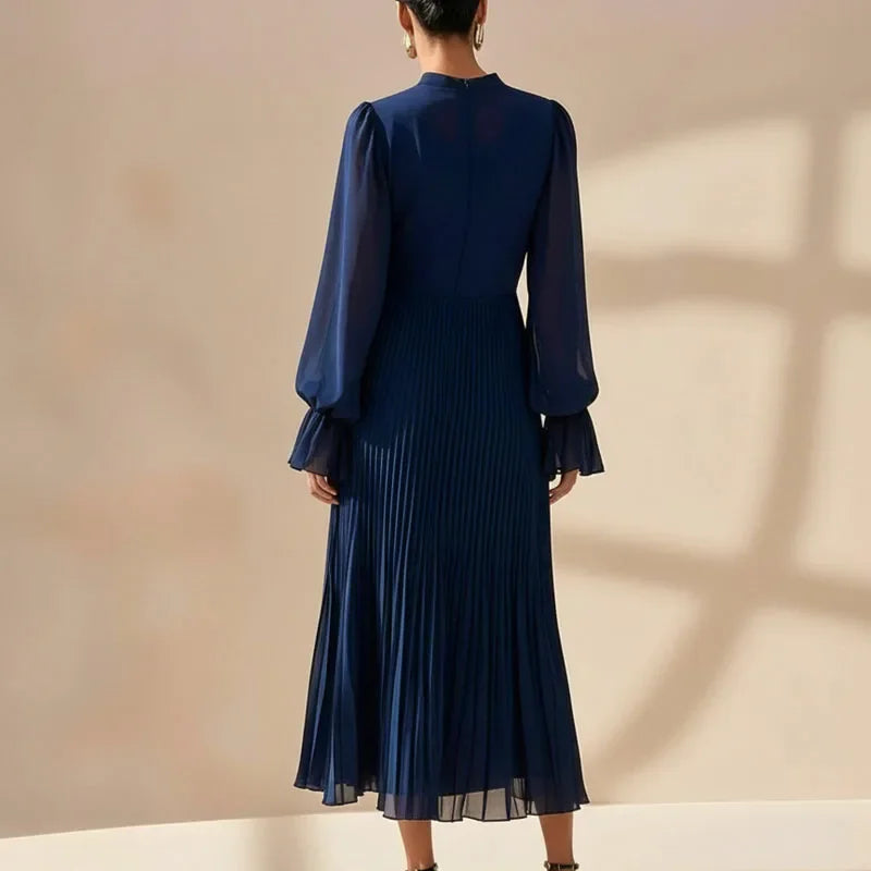 Lioren™ Dress with Sophisticated Pleats and Asymmetrical Ruffles